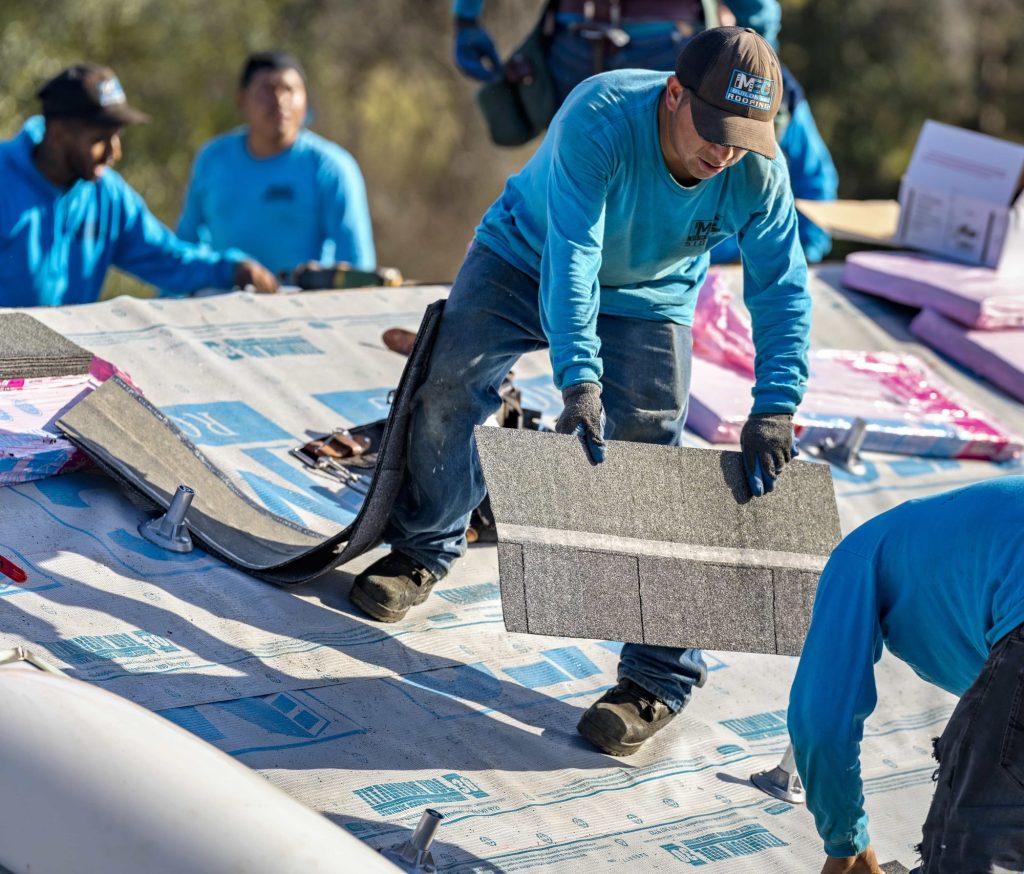 MEC Builds team installing roofing