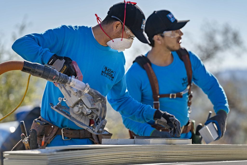 MEC Builds crew preparing new roof