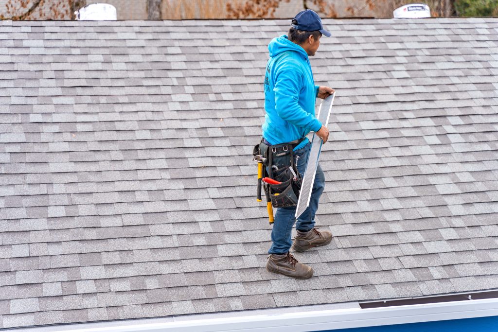 MEC Builds team installing roof repairs